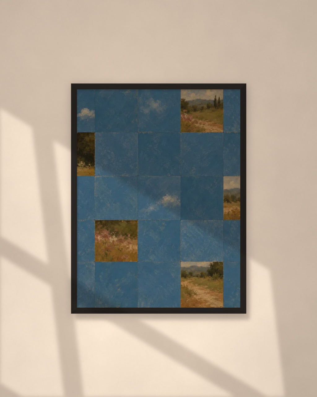 Blue Garden Tiles art print in a black frame on a warm beige wall with sunlight and window shadows