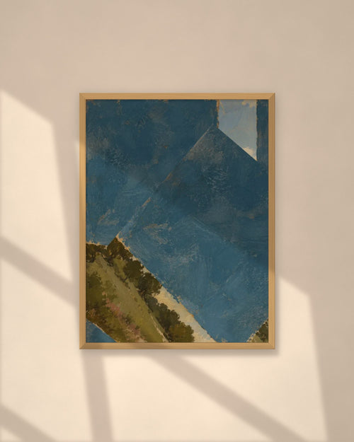 Blue Horizon art print in a natural oak frame on a warm plaster wall