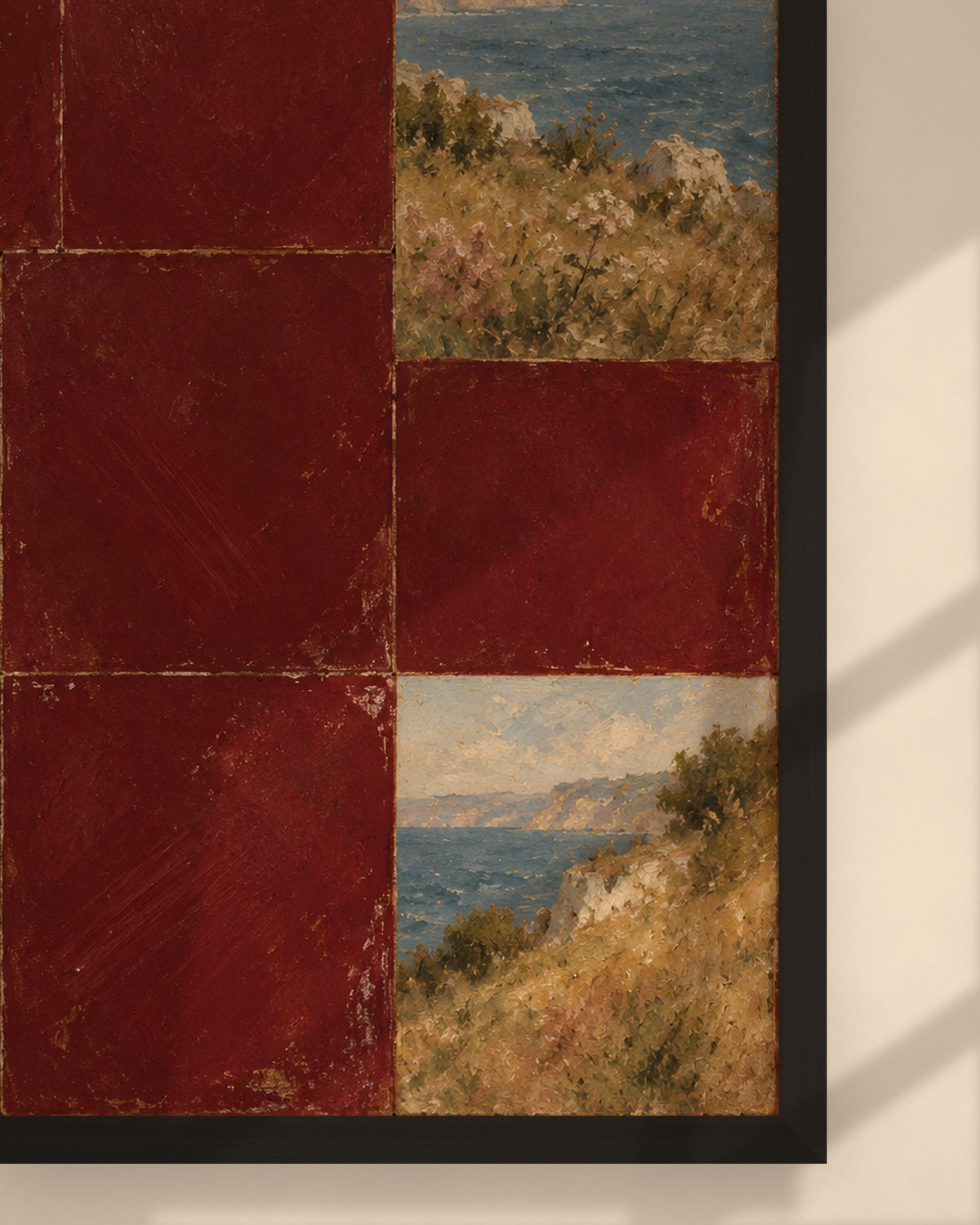Burgundy Coast Tiles art print in a black frame above a wooden desk in a bright Scandinavian study