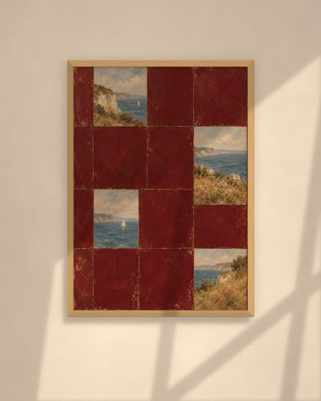 Burgundy Coast Tiles art print in a walnut frame above a brown leather Chesterfield armchair