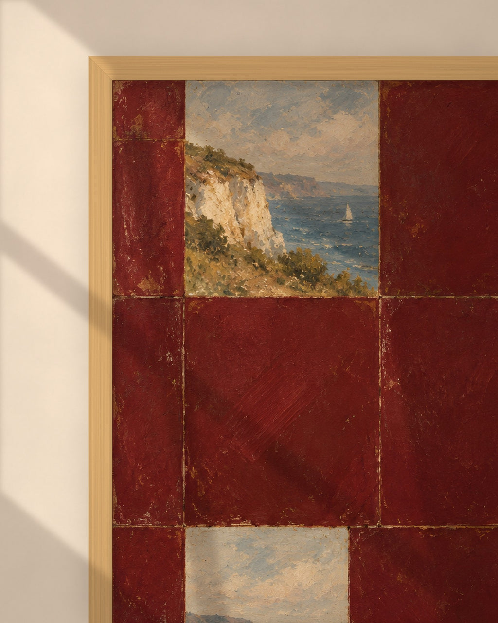 Burgundy Coast Tiles art print in a natural oak frame above a cream sofa in a sunlit living room