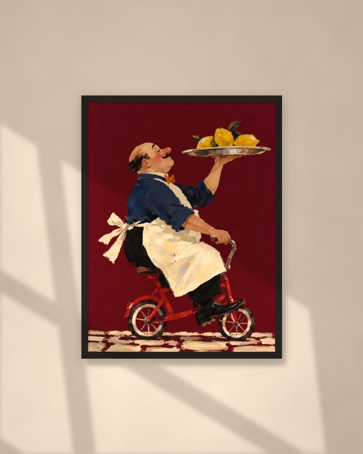 Lemon Delivery art print in a black frame on a warm beige wall with sunlight and window shadows