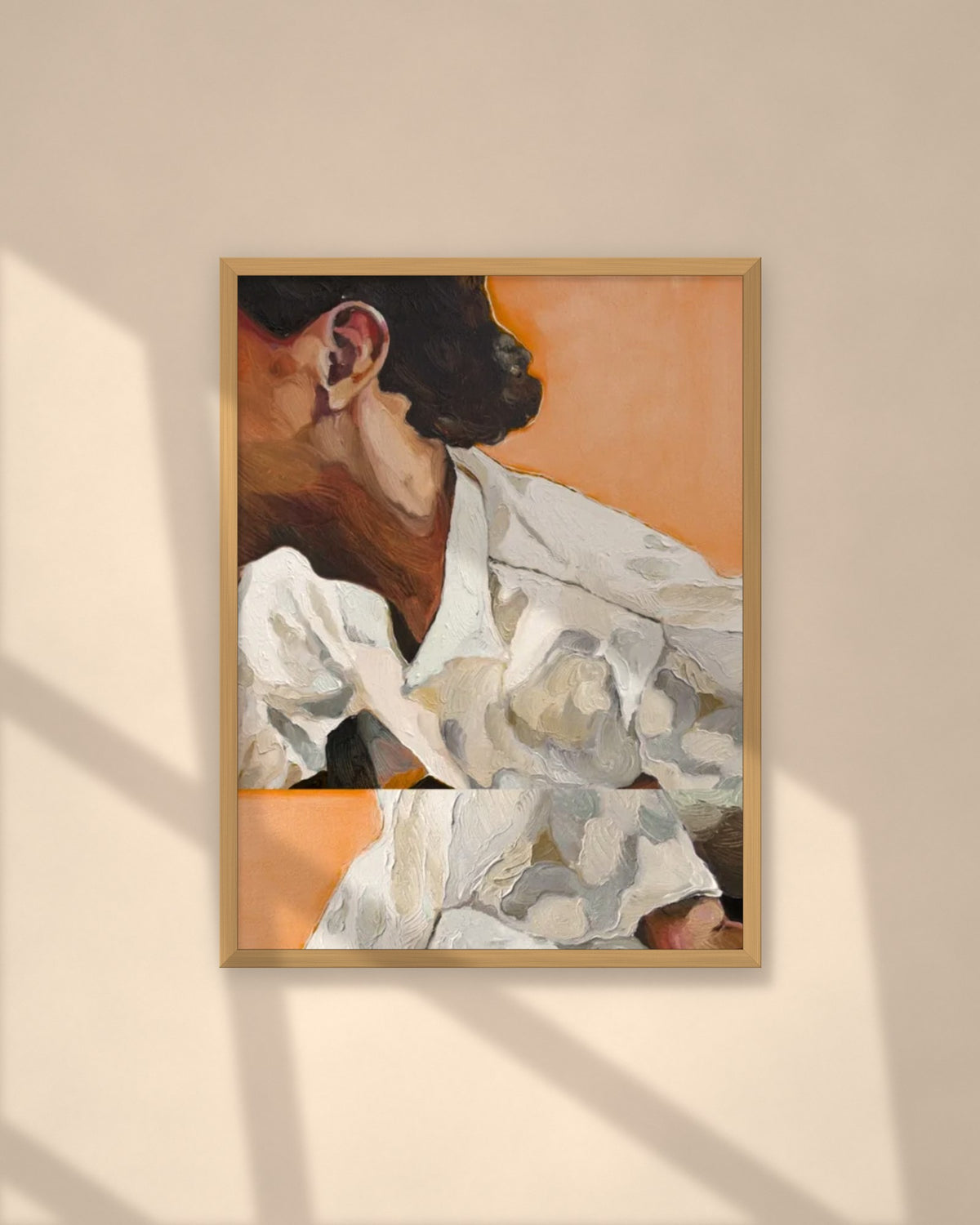 Linen in Apricot art print in a natural oak frame on a warm plaster wall