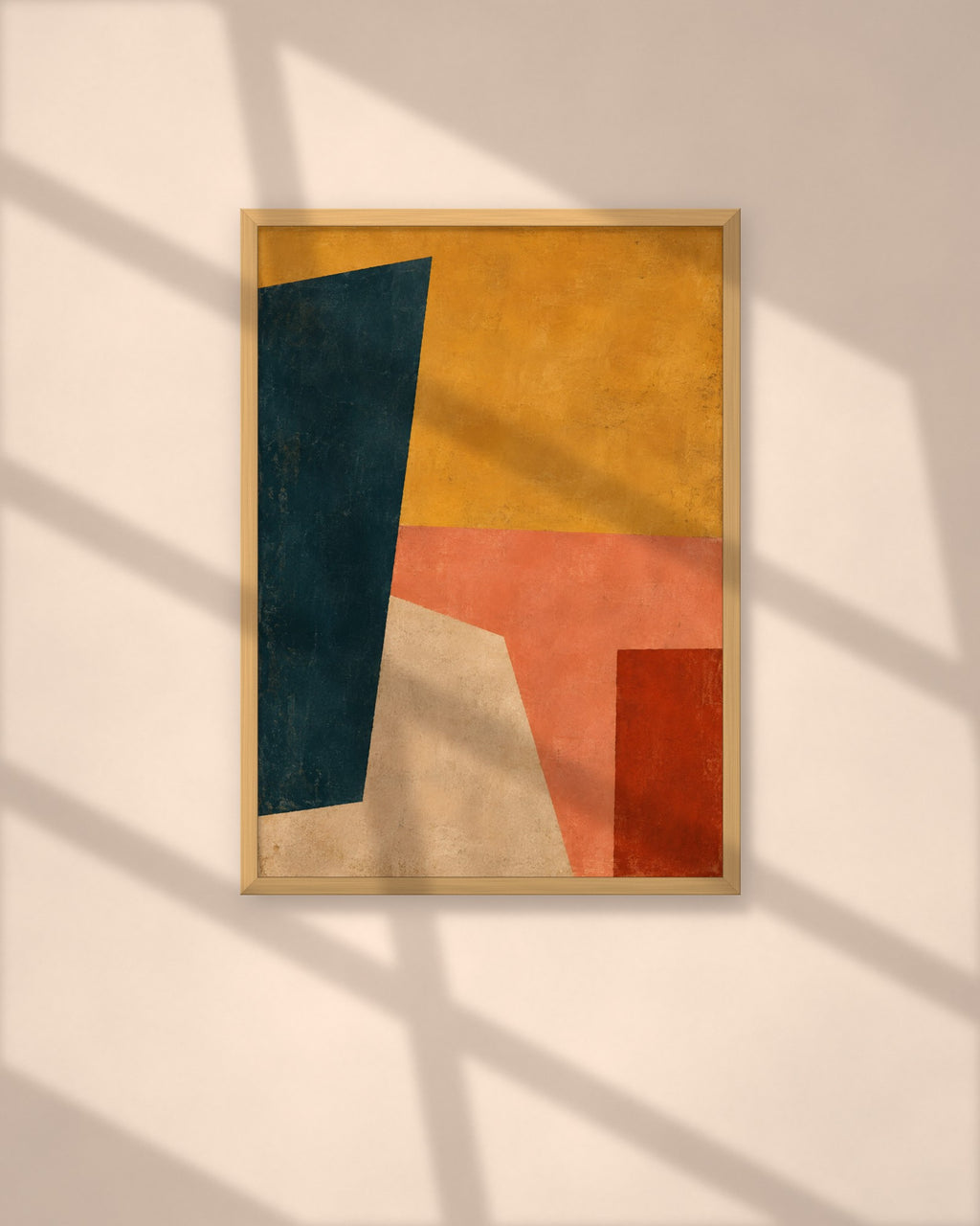 Saffron Composition art print in a natural oak frame above a wooden desk in a bright Scandinavian study