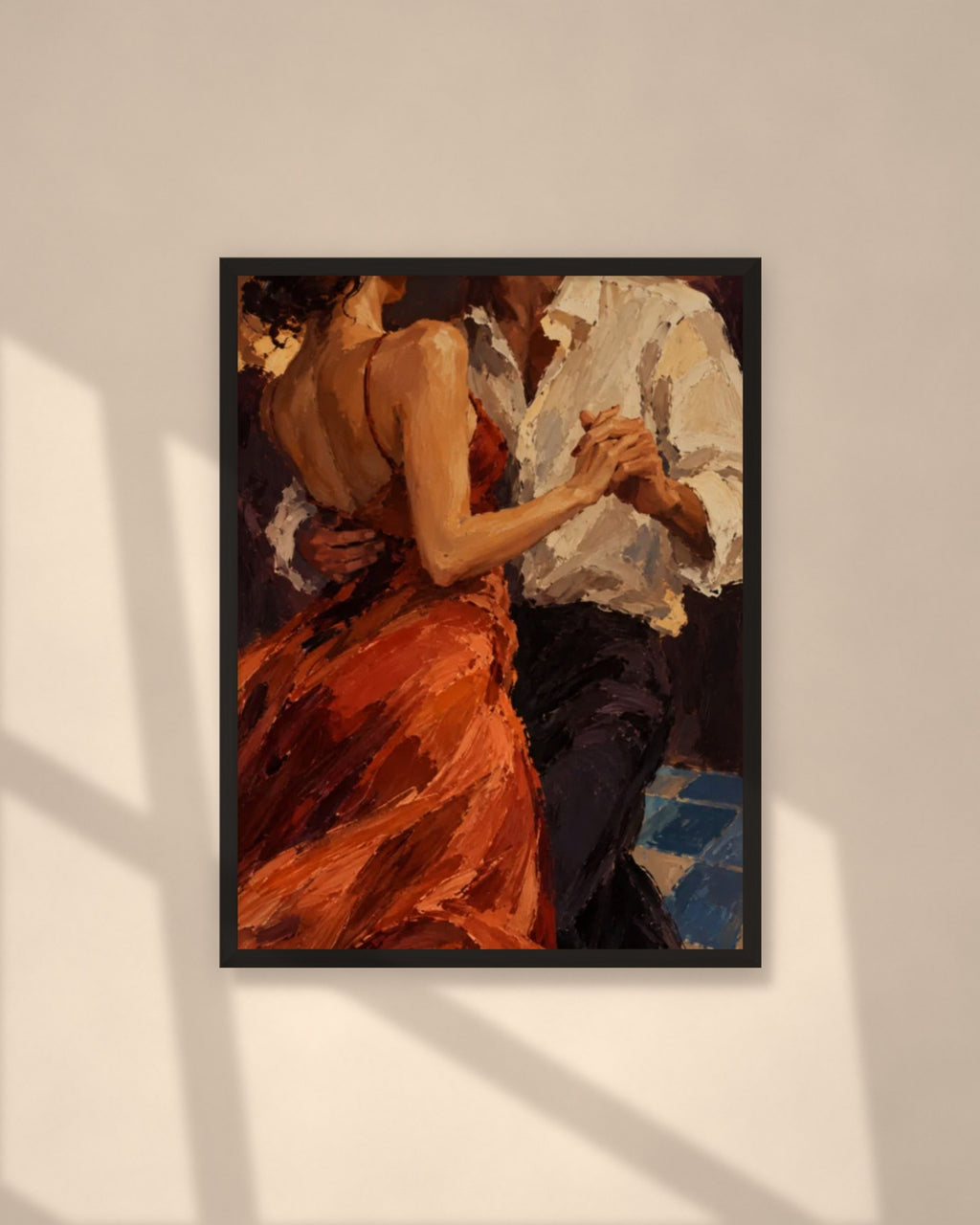 Slow Dance art print in a black frame on a warm beige wall with sunlight and window shadows