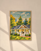 Summer Cottage art print in a natural oak frame on a warm plaster wall