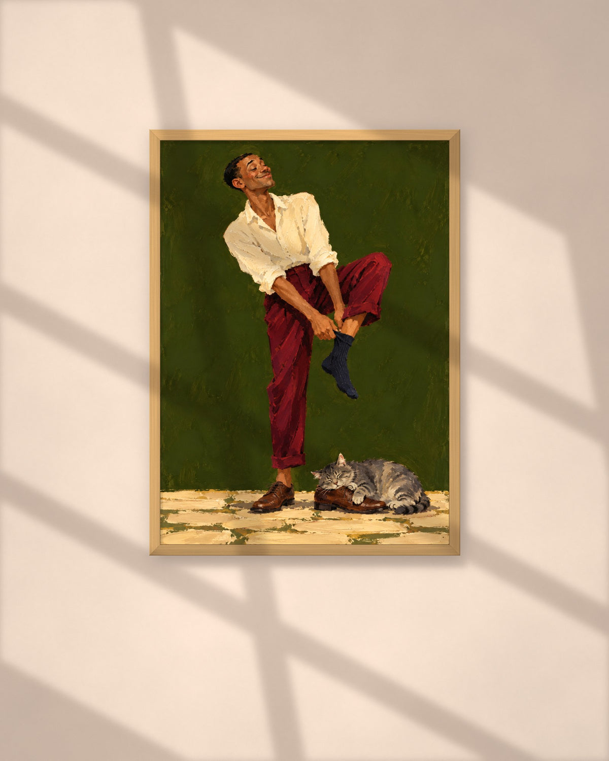 Sunday Socks art print in a natural oak frame above a wooden desk in a bright Scandinavian study