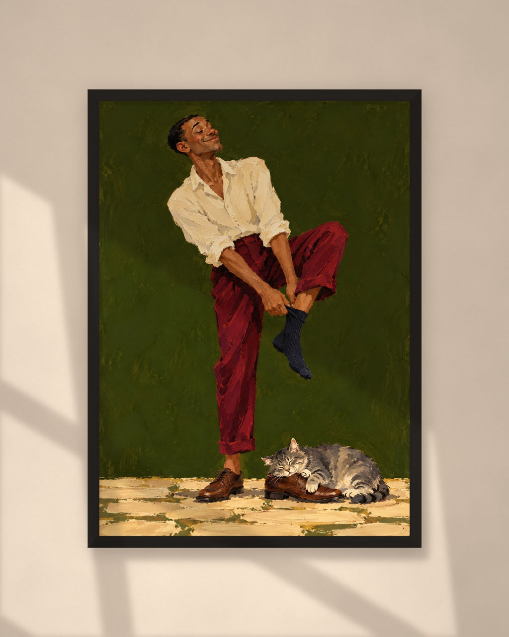 Sunday Socks art print in a black frame on a warm beige wall with sunlight and window shadows