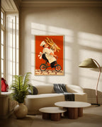 The Baguette Run art print in a natural oak frame above a cream curved sofa in a sunlit living room