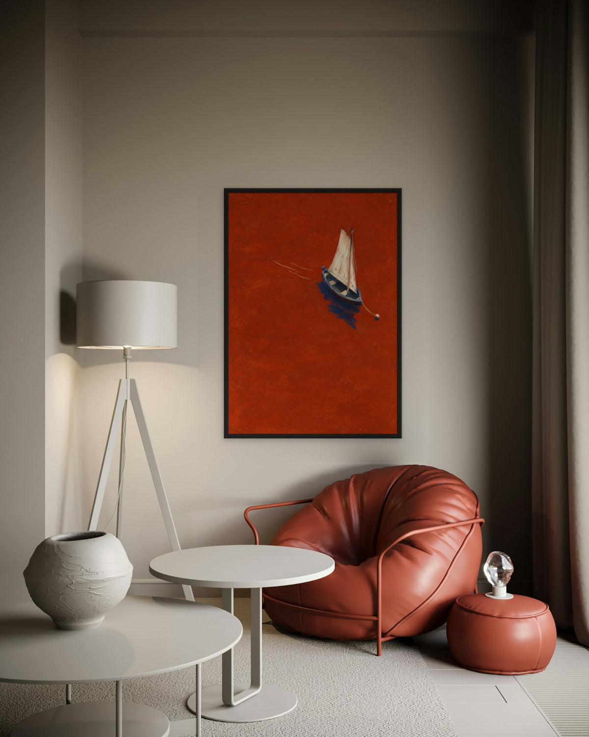 Vermilion Sail art print in a black frame above a terracotta leather lounge chair in a softly lit corner